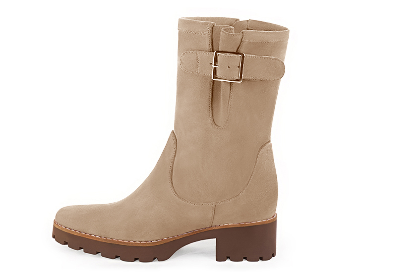 Tan beige women's ankle boots with buckles on the sides. Round toe. Low rubber soles. Profile view - Florence KOOIJMAN